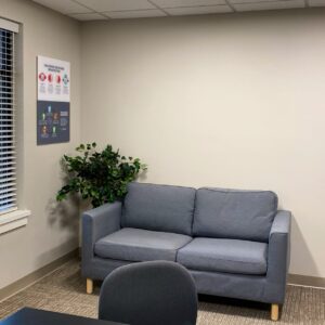 lobby with couch and infographic on wall