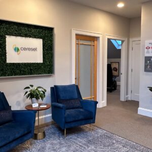 client center lobby with greenwall shadowbox on the wall with the Cereset logo