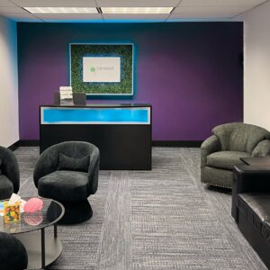 lobby with chairs and Cereset Chesterfield logo plant wall