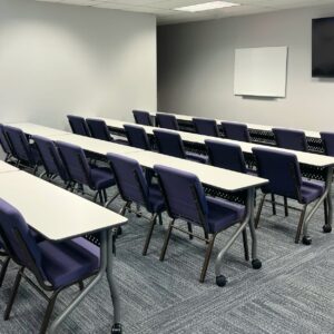 conference room with white board and tv