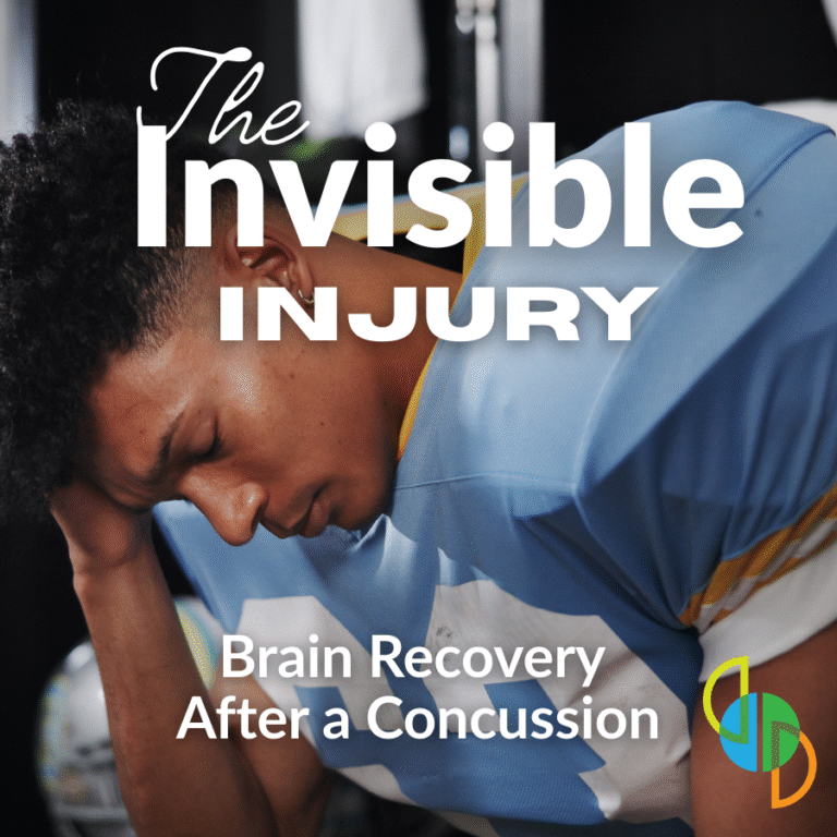 Football athlete holding head after a concussion injury